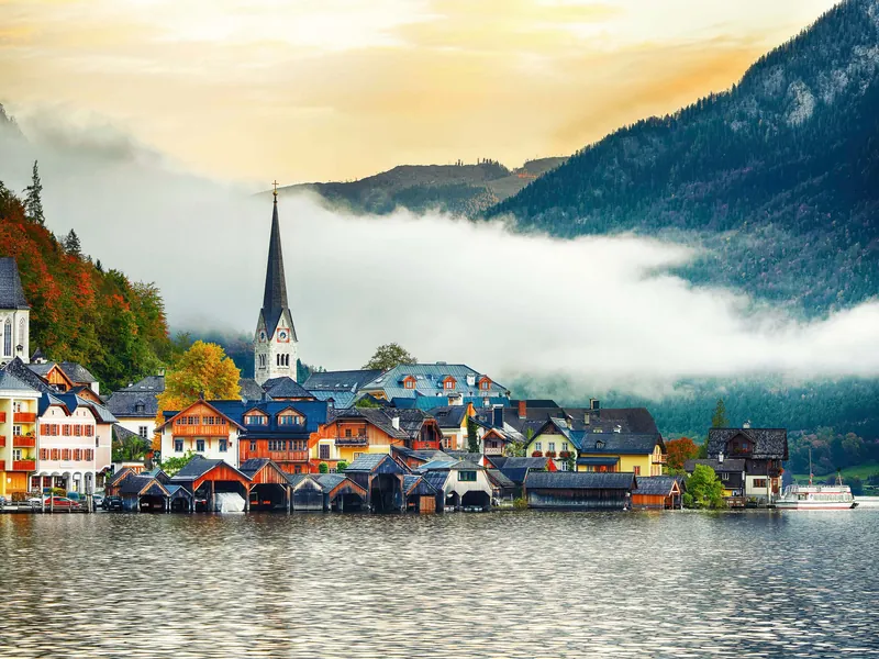 Hallstatt seen from the north end of the lake with morning mist over the water